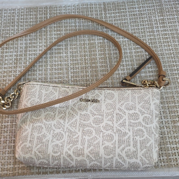 Calvin Klein Handbags - Calvin Klein Beige Logo Crossbody Bag